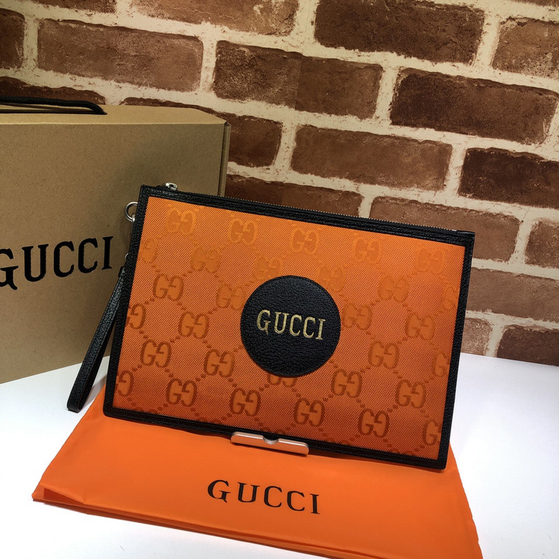 G*u*i clutch bag